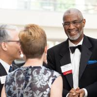 Guests mingling before the Enrichment Dinner.